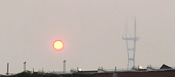 Smoke-diffused sun and Sutro Tower